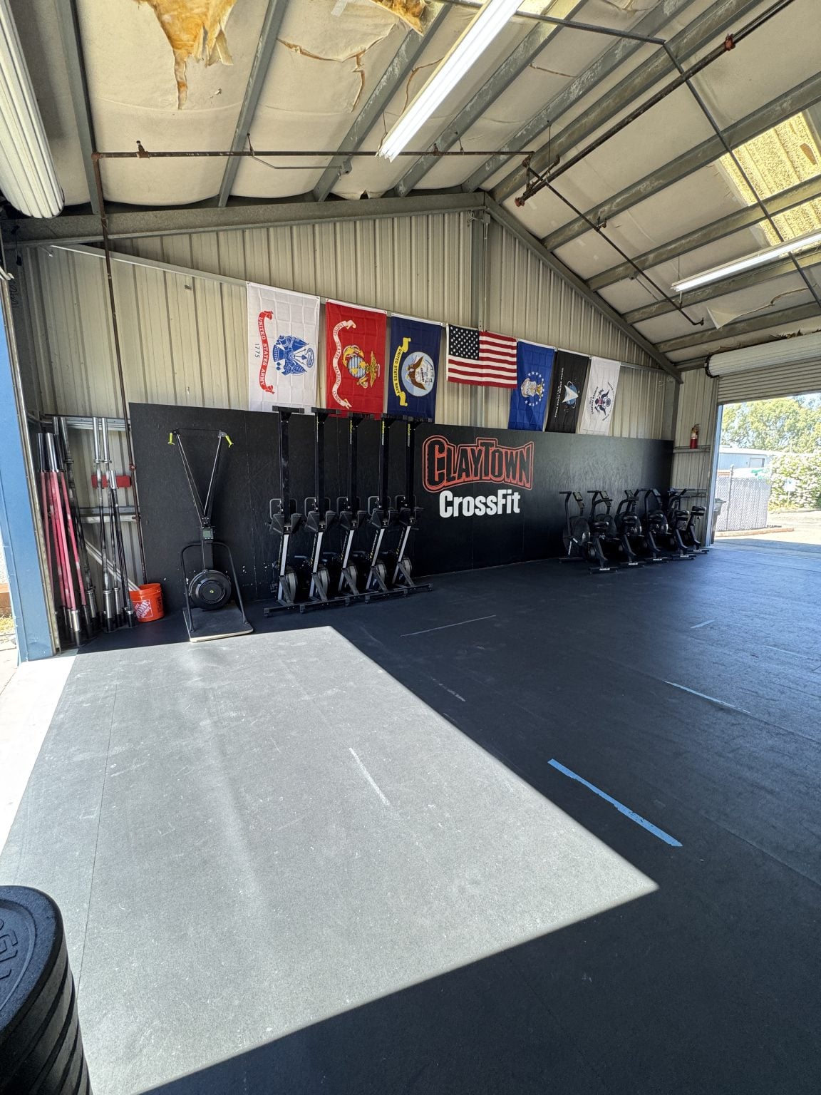 Military flag wall and Claytown CrossFit logo