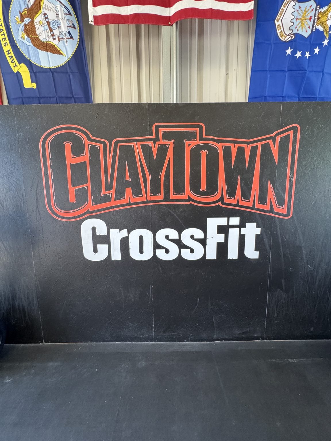 Claytown CrossFit logo on the gym wall